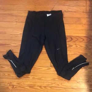 Nike fit dry leggings with zippers on leg bottoms